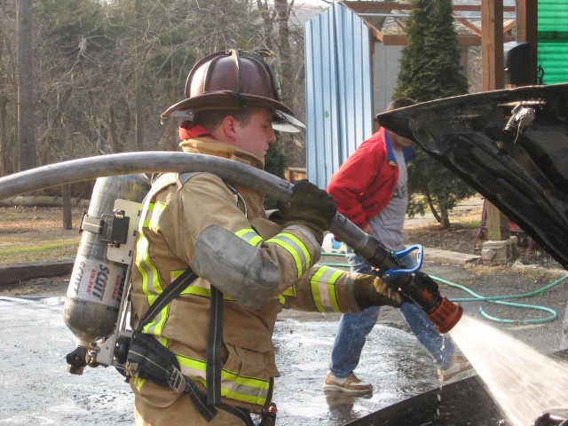 Firefighter Mike Hallman at a car fire on Elkdale Road.